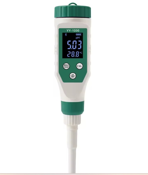 Handheld pH/temperature meter with green accents; digital display shows pH and temperature, connected to a probe.